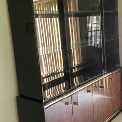 4 Glass Door, 2 Glass Shelves, 2 Interior Lights, Mirrored Back, Top Portion Of This China Cabinet 