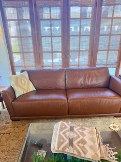 Living room set: Leather sofa, loveseat, and chair