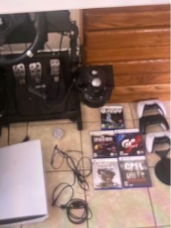PS5 Console Bundle with Racing Wheel and Games