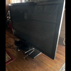 42’ Insignia TV with original remote and fire stick with remote 