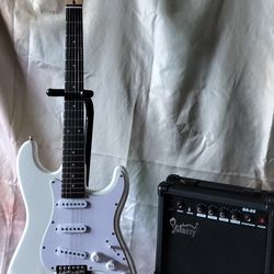 Brand new electric guitar with new 20 watts amp bag and cable