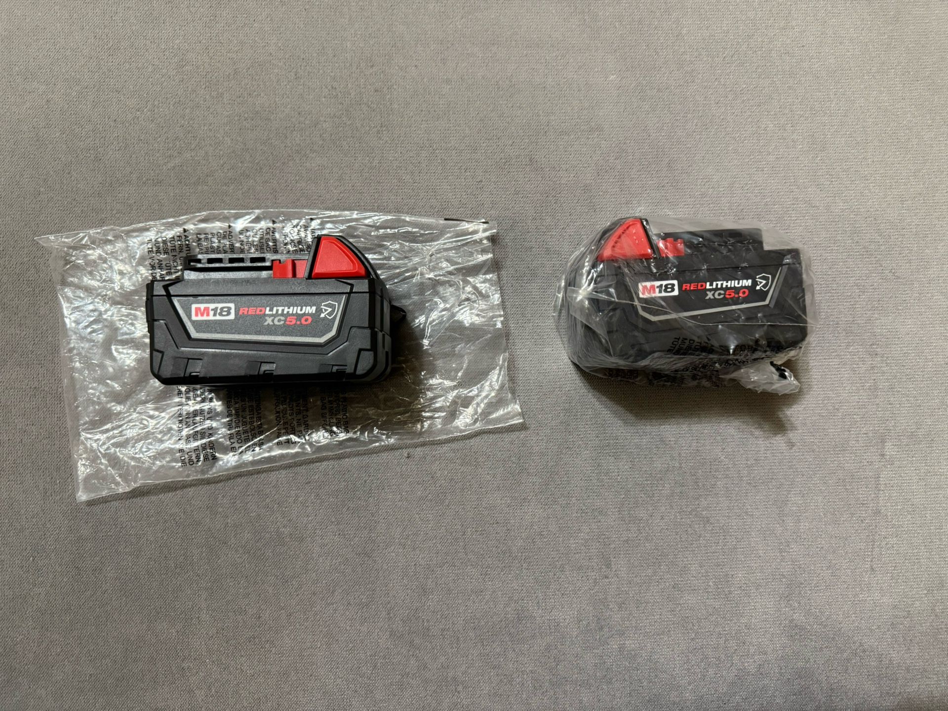 M18 18-Volt 5.0 Ah Lithium-Ion XC Extended Capacity Resistant Battery Pack (2 For $130) (1 For $70)