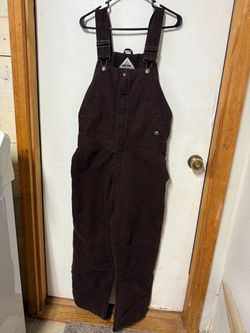 Brown Ridgecut Toughshield Sanded Duck Insulated Bib Overalls. These are from Tractor Supply. They are ladies size Large short (14-16) - can be unisex