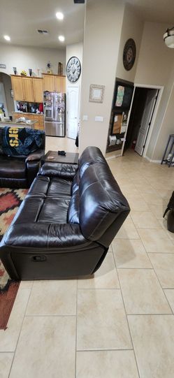 Brown leather,manual leather reclining love seat