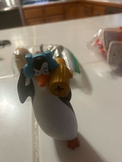 Kowalski Launcher toy from a McDonald's Penguins of Madagascar Happy Meal promotion.
