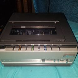 Old VCR Recorder And A Paper Shredder
