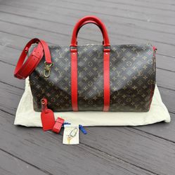 Louis Vuitton Keepall 50 Monogram Bandouliere Red Trim