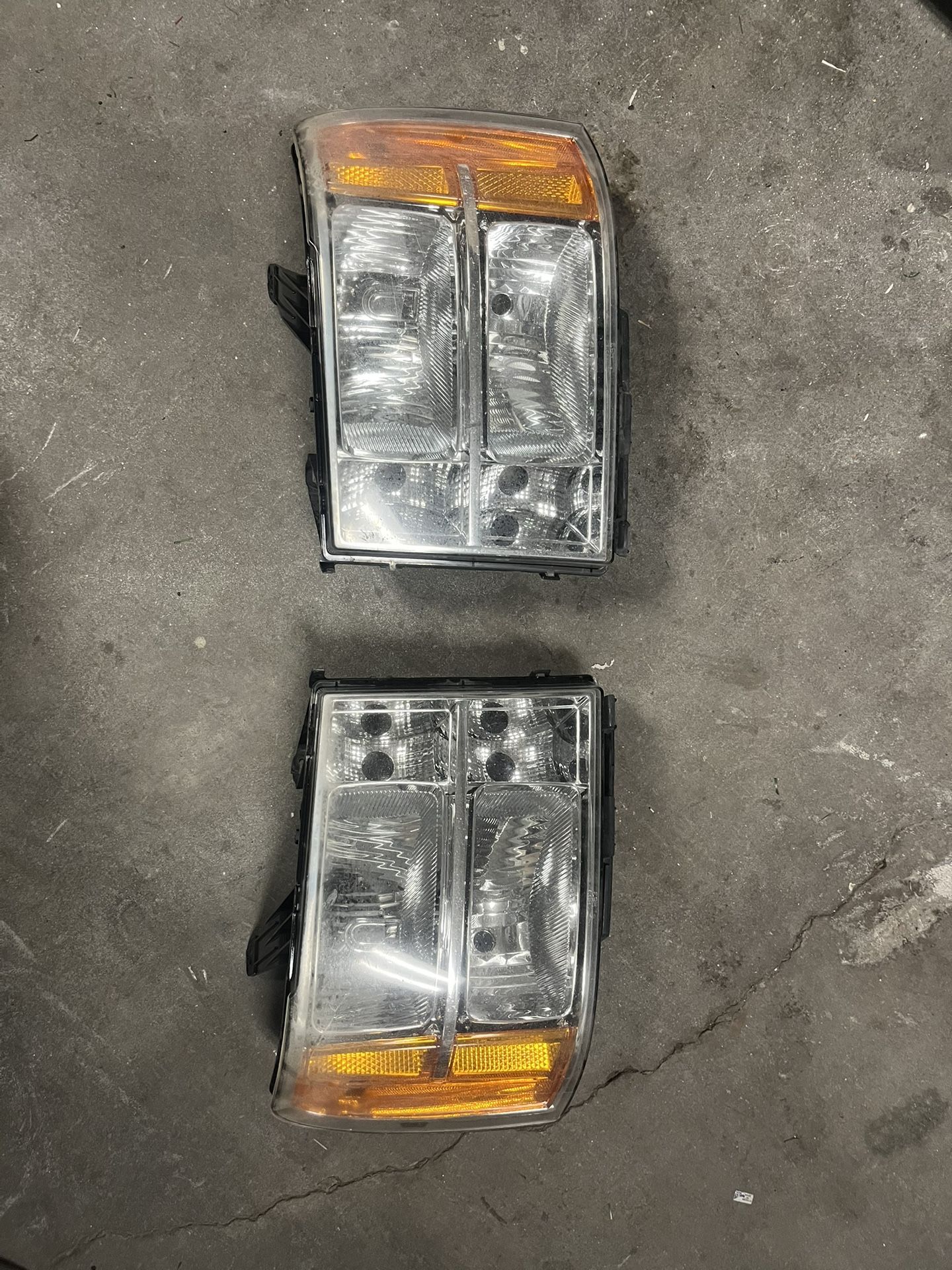 GMC Sierra OEM headlights