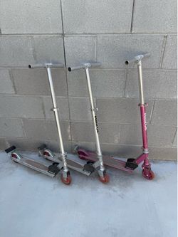Three adjustable razor scooters $15 all three