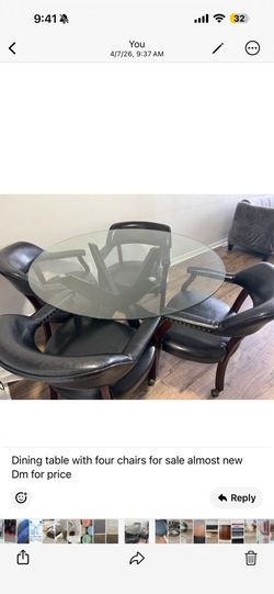 Round glass dining table with 4 leather chairs