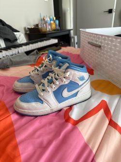 Blue and white Nikes
