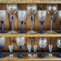 Cristal Glasses w/Cobalt Blue Stems. 19 Piece Set. 5-10”, 6-8”, 2-7”,6-5”.