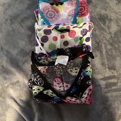 Medium scrub shirts five dollars each