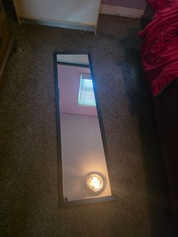 Black wall mirror