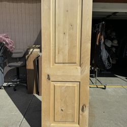 Brand New 24 in. x 80 in. Rustic Knotty Alder 2-Panel Top Rail Arch Solid Wood Core Stainable Interior Door Slab