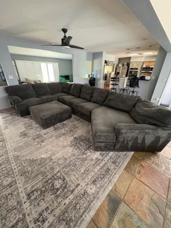 Approximately 13ft grey couch