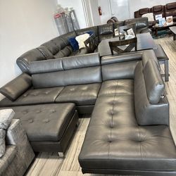 Winter clearance sale. Ibiza gray sectional with ottoman only $899. Easy finance option. Same-day delivery.