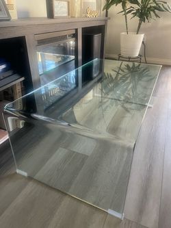 Brand-New Clear Glass Waterfall Coffee Table – $100