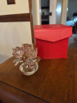 Pink crystal roses in a crystal stand with storage