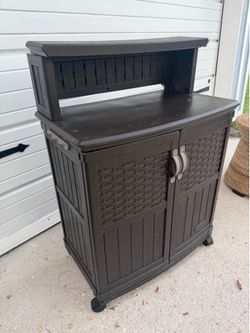 Suncast outdoor rolling storage prep cart