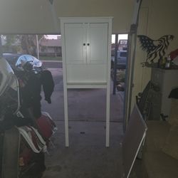 Behind The Toilet Shelf 