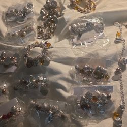 Beautiful Bracelets With Charms, Colors  Beads, Silver Color Charms. Have 14. Each $5  