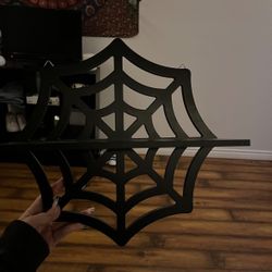 Spider web shelf
