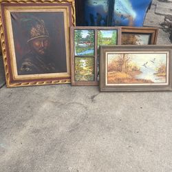 4 Very Nic Artworks In Wood Frames And 1 Large Curly Detailed Frame