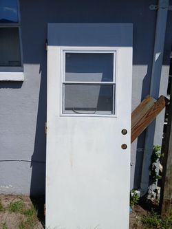 EXTERIOR DOOR WITH WINDOW