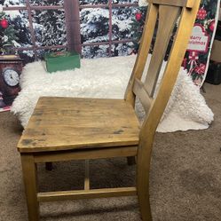 The wooden table is very heavy. It's made of natural wood.