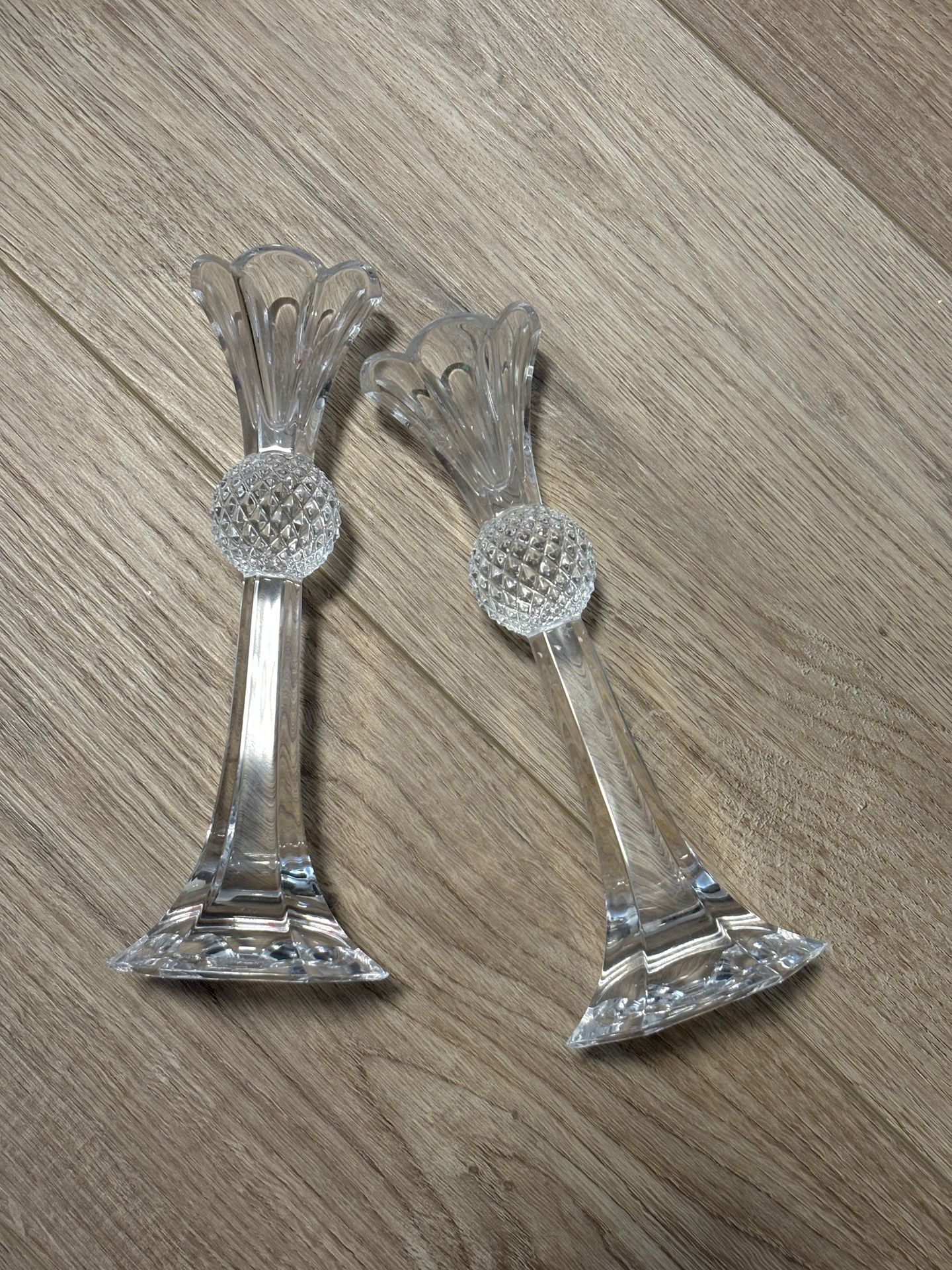 Veriaty of long candle sticks and holders