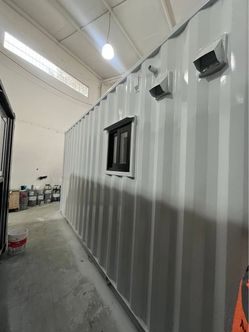 Container home with toilet and AC