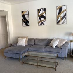 Grey Couch With Gold Highlights 