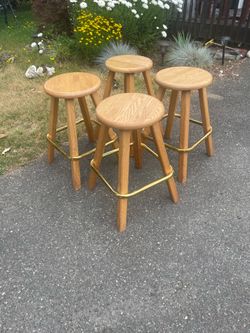 Set of 4 Oak Bar Stools with Brass Footrests (24 inch height
