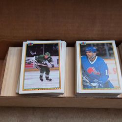 1990 91 box of Hockey Cards about 500 7th Inning Sketch OHL and Topps untouched since the 1990s 

This is a box of hockey cards 

Featuring a majority