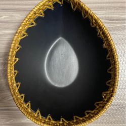 Black Ceramic tear drop shaped decor bowl with woven wicker around Edge
