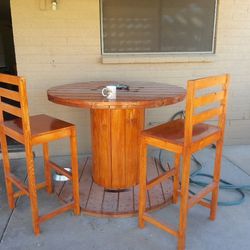 Wooden Spool Table With 4 High top Bar chairs 