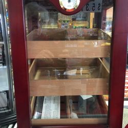 Cigar Humidor  Small Tabke Top About 30” Tall Cherry Ginish  It Is New Old Stock    Retail Is 200$  Asking 100$ Orbest Offer Pick Up Only