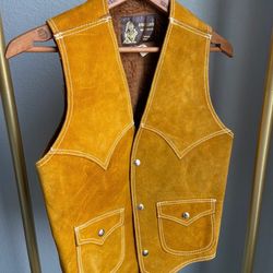Vintage leather and faux fur lined vest