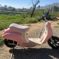 Pink razor, electric moped