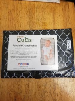Portable baby changing pad, new.