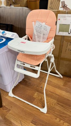 Baby Joy Foldable High Chair in a pink color, featuring a white plastic tray and a 5-point safety harness