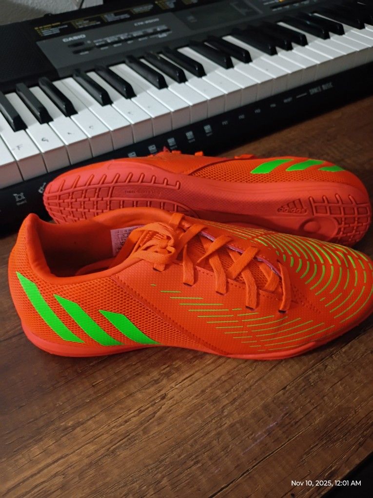 Like New. This is an Adidas Predator Edge.4 in Sala soccer shoe in solar red and solar green. Us Size 7