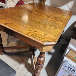 Antique Wood Table with ornate bib and 6 ornate legs. 
50" Long x 38"w x 30.5"h