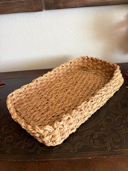 rectangular hand-woven water hyacinth decorative tray featuring a chunky braided natural wicker texture.