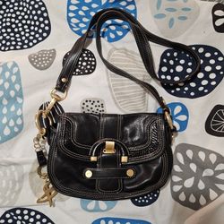 B. Makowsky Black Leather Shoulder Bag Purse with Metal Logo Charm