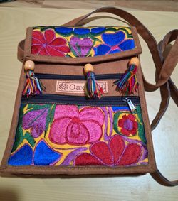 New handmade Mexican artisan crossbody bag features vibrant floral embroidery