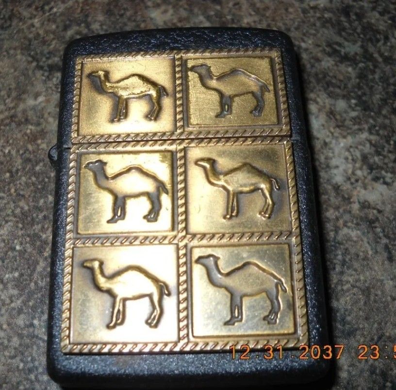 90.00

1994 Zippo Camel Herd Black Crackle Brass Raised Emblem Sealed


