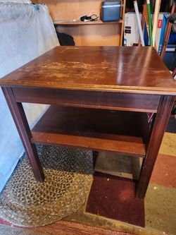 Sturdy wood Coffee table Or end table .