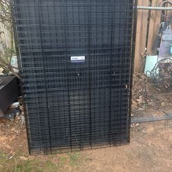 Large dog cage, new, and a medium dog cage